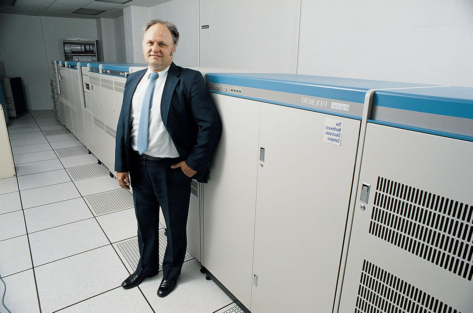 In 1984, Dr. Jon Rickman, who was then Northwest’s director of computer services and retired in 2011 as vice president of information systems after 35 years at the University, stands by the dual VAX in the B.D. Owens Library’s computing Center.