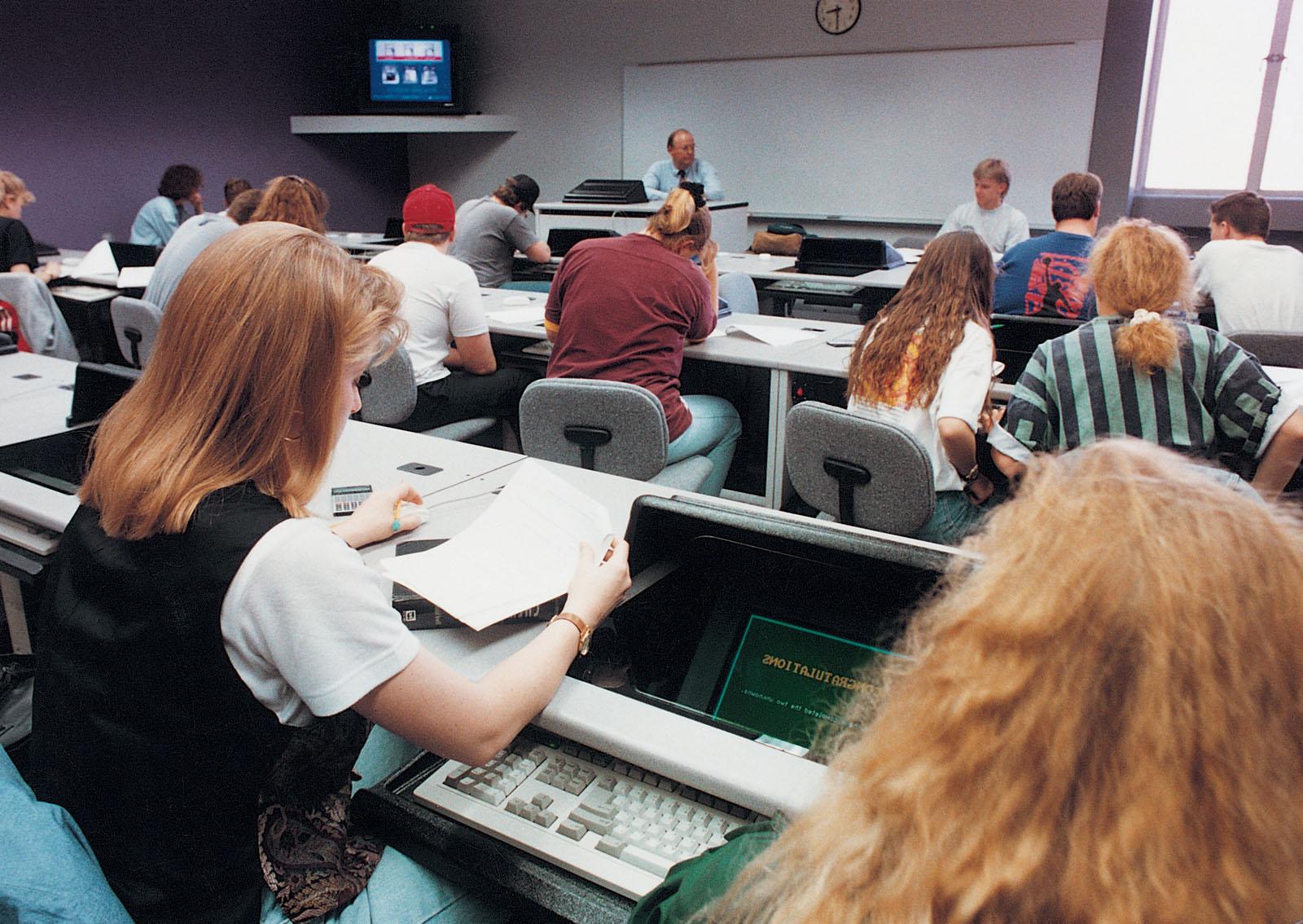 Students gathered in an early electronic classroom in the Garrett-Strong Science Building with Dr. Harlan Higginbotham teaching a general chemistry course.