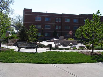 The Centennial Garden, which features a gas fire pit, water fountains, plant life, benches and a grassy area, honors Northwest's "Quad" buildings (now demolished) and their namesakes: C.A. Hawkins,  J.W. Hake, Jack McCracken and A.H. 'Bert' Cooper. The Centennial Garden was completed in October 2005 for $300,000.